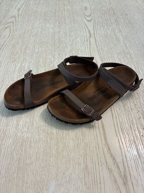 Women’s Birkenstock Daloa Narrow Footbed Cork Sandals (Brown)